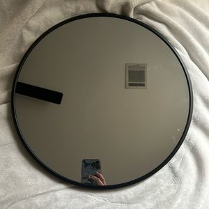 Round small mirror